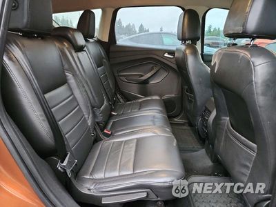 Zdjęcie 11 z 14 samochodu: 2017 FORD ESCAPE TITANIUM VIN:1FMCU9J90HUC38837 - miniatura