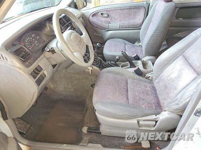 Zdjęcie 7 z 12 samochodu: 1999 CHEVROLET TRACKER VIN:2CNBJ186XX6915553 - miniatura