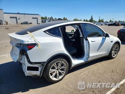 Trzecie zdjęcie samochodu z tyłu: 2023 TESLA MODEL Y VIN:7SAYGDEE2PF793326 - miniatura