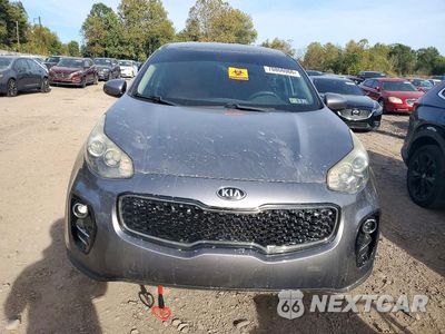 Piąte zdjęcie samochodu w środku: 2017 KIA SPORTAGE LX VIN:KNDPMCACXH7177493 - miniatura