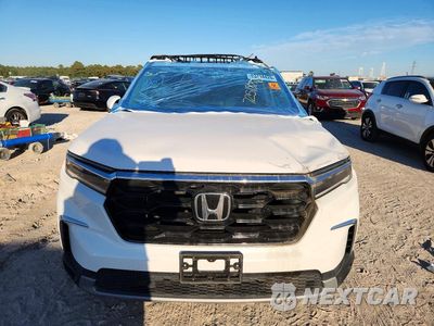 Piąte zdjęcie samochodu w środku: 2025 HONDA PILOT TOURING VIN:5FNYG2H79SB000255 - miniatura