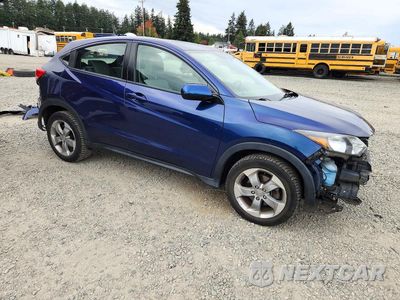 Czwarte zdjęcie samochodu z boku: 2017 HONDA HR-V LX VIN:3CZRU6H33HM732624 - miniatura