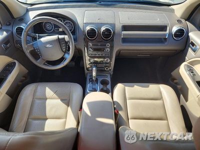 Zdjęcie 8 z 13 samochodu: 2008 FORD TAURUS X SEL VIN:1FMDK02W88GA12702 - miniatura