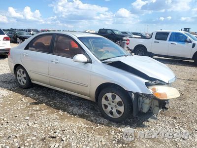 Czwarte zdjęcie samochodu z boku: 2009 KIA SPECTRA LX VIN:KNAFE221995624986 - miniatura
