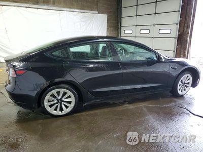 Trzecie zdjęcie samochodu z tyłu: 2022 TESLA MODEL 3 VIN:5YJ3E1EA3NF371474 - miniatura