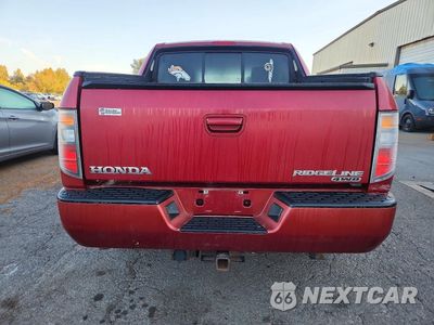 Zdjęcie 6 z 12 samochodu: 2006 HONDA RIDGELINE VIN:2HJYK16516H538504 - miniatura
