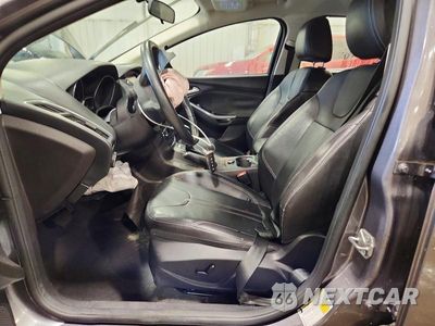 Zdjęcie 7 z 13 samochodu: 2014 FORD FOCUS TITANIUM VIN:1FADP3N2XEL316185 - miniatura