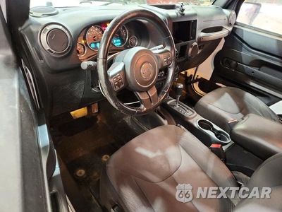 Zdjęcie 8 z 12 samochodu: 2016 JEEP WRANGLER SPORT VIN:1C4AJWAG4GL187445 - miniatura
