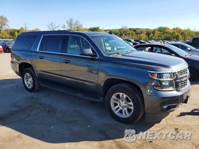 Czwarte zdjęcie samochodu z boku: 2019 CHEVROLET SUBURBAN K1500 LT VIN:1GNSKHKCXKR329450 - miniatura