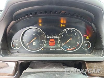 Zdjęcie 9 z 12 samochodu: 2015 BMW 750 LI VIN:WBAYE8C59FD780900 - miniatura