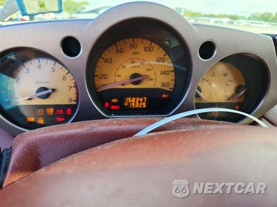 Zdjęcie 9 z 13 samochodu: 2004 NISSAN MURANO SL VIN:JN8AZ08W24W326392 - miniatura