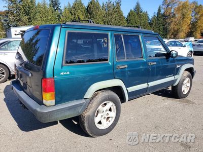 Trzecie zdjęcie samochodu z tyłu: 1998 JEEP CHEROKEE SPORT VIN:1J4FJ68S4WL227788 - miniatura