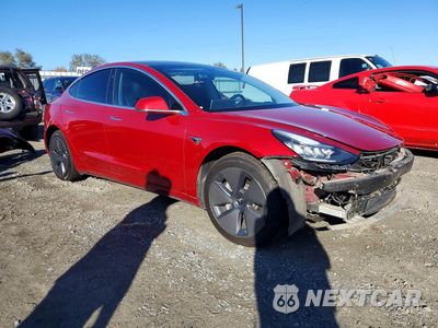 Czwarte zdjęcie samochodu z boku: 2019 TESLA MODEL 3 VIN:5YJ3E1EA1KF299041 - miniatura