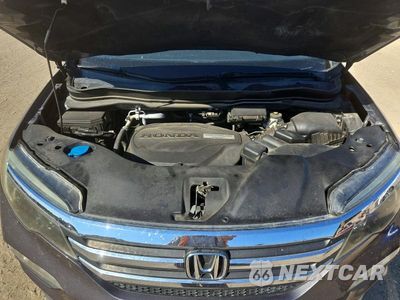 Zdjęcie 12 z 13 samochodu: 2017 HONDA PILOT EXLN VIN:5FNYF5H77HB034336 - miniatura