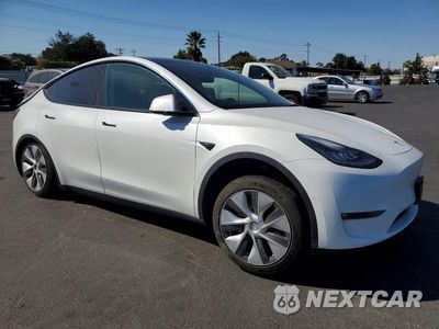 Czwarte zdjęcie samochodu z boku: 2021 TESLA MODEL Y VIN:5YJYGDEE5MF230036 - miniatura