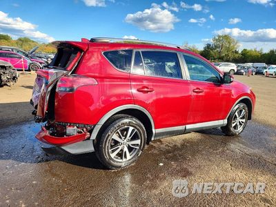 Trzecie zdjęcie samochodu z tyłu: 2018 TOYOTA RAV4 XLE VIN:JTMRFREV1JD256835 - miniatura
