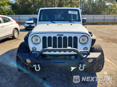 Piąte zdjęcie samochodu w środku: 2017 JEEP WRANGLER UNLIMITED SPORT VIN:1C4BJWDG2HL725822 - miniatura