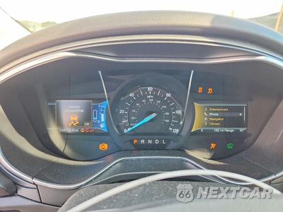 Zdjęcie 9 z 12 samochodu: 2015 FORD FUSION TITANIUM PHEV VIN:3FA6P0SU2FR293856 - miniatura
