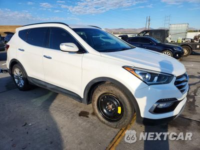 Czwarte zdjęcie samochodu z boku: 2018 HYUNDAI SANTA FE SPORT 2.0T VIN:5XYZUDLA1JG548639 - miniatura