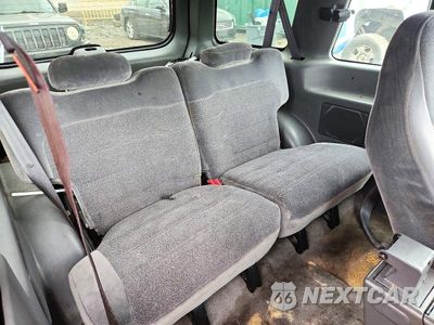 Zdjęcie 11 z 13 samochodu: 1999 FORD EXPLORER VIN:1FMYU24EXXUA14043 - miniatura