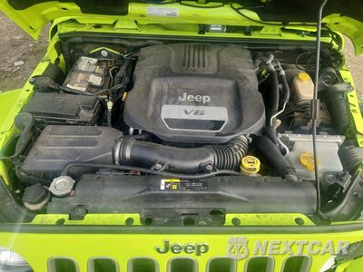 Zdjęcie 11 z 12 samochodu: 2017 JEEP WRANGLER UNLIMITED SAHARA VIN:1C4HJWEGXHL507989 - miniatura