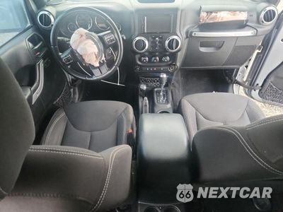 Zdjęcie 8 z 13 samochodu: 2015 JEEP WRANGLER UNLIMITED SAHARA VIN:1C4BJWEG9FL693818 - miniatura