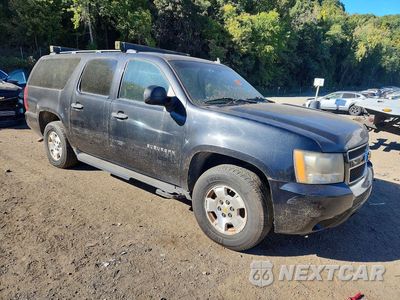 Czwarte zdjęcie samochodu z boku: 2010 CHEVROLET SUBURBAN K1500 LS VIN:1GNUKHE33AR215311 - miniatura