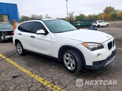 Czwarte zdjęcie samochodu z boku: 2014 BMW X1 SDRIVE28I VIN:WBAVM1C57EVW49101 - miniatura