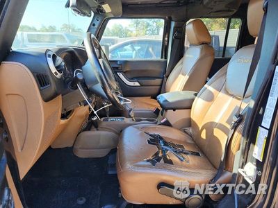 Zdjęcie 7 z 13 samochodu: 2014 JEEP WRANGLER UNLIMITED SAHARA VIN:1C4BJWEG1EL138487 - miniatura