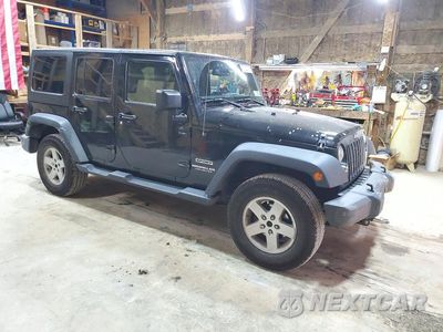 Czwarte zdjęcie samochodu z boku: 2015 JEEP WRANGLER UNLIMITED SPORT VIN:1C4BJWDG1FL761014 - miniatura
