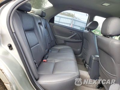 Zdjęcie 10 z 13 samochodu: 2000 TOYOTA CAMRY LE V6 VIN:JT2BF22K8Y0261415 - miniatura