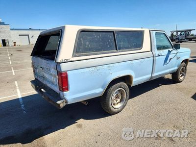 Trzecie zdjęcie samochodu z tyłu: 1985 FORD RANGER VIN:1FTCR11S4FUC86445 - miniatura