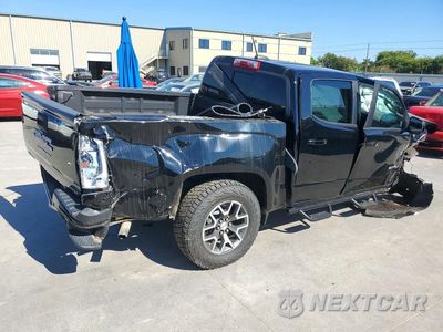 Trzecie zdjęcie samochodu z tyłu: 2021 GMC CANYON AT4 VIN:1GTG6FEN0M1100068 - miniatura