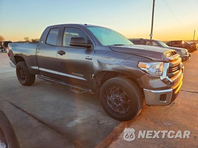 Czwarte zdjęcie samochodu z boku: 2014 TOYOTA TUNDRA SR5 VIN:5TFUW5F11EX377612 - miniatura