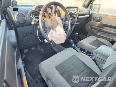 Zdjęcie 8 z 13 samochodu: 2010 JEEP WRANGLER SPORT VIN:1J4GA2D12AL216856 - miniatura