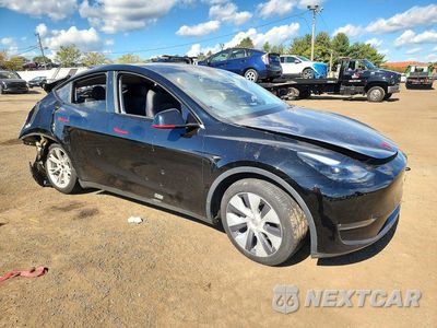 Czwarte zdjęcie samochodu z boku: 2023 TESLA MODEL Y VIN:7SAYGDEE6PA201326 - miniatura