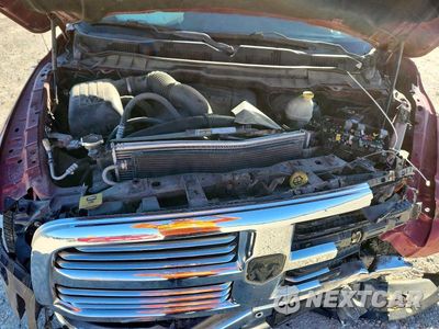 Zdjęcie 11 z 13 samochodu: 2014 RAM 1500 SLT VIN:1C6RR6LT1ES429785 - miniatura
