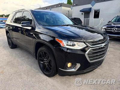 Czwarte zdjęcie samochodu z boku: 2021 CHEVROLET TRAVERSE LT VIN:1GNERGKW7MJ168621 - miniatura