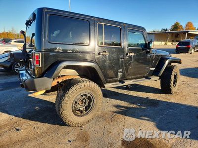 Trzecie zdjęcie samochodu z tyłu: 2011 JEEP WRANGLER UNLIMITED SPORT VIN:1J4HA3H12BL615417 - miniatura
