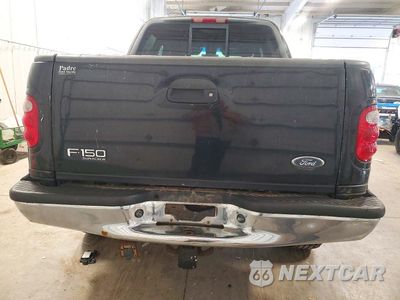 Zdjęcie 6 z 12 samochodu: 2001 FORD F150 SUPERCREW VIN:1FTRW08L31KE19552 - miniatura