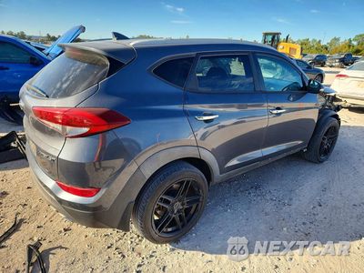 Trzecie zdjęcie samochodu z tyłu: 2016 HYUNDAI TUCSON LIMITED VIN:KM8J33A22GU026630 - miniatura