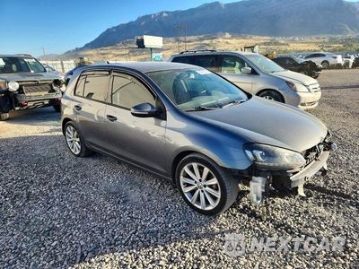 Czwarte zdjęcie samochodu z boku: 2012 VOLKSWAGEN GOLF VIN:WVWNM7AJ6CW240133 - miniatura