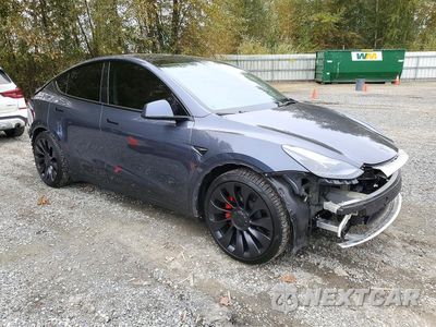 Czwarte zdjęcie samochodu z boku: 2022 TESLA MODEL Y VIN:7SAYGDEF2NF544580 - miniatura