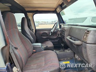 Zdjęcie 10 z 12 samochodu: 2000 JEEP WRANGLER / TJ SPORT VIN:1J4FA49S5YP745357 - miniatura