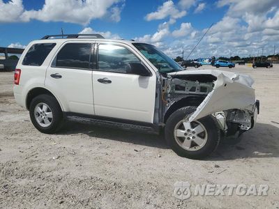 Czwarte zdjęcie samochodu z boku: 2012 FORD ESCAPE XLT VIN:1FMCU0DG9CKB15872 - miniatura