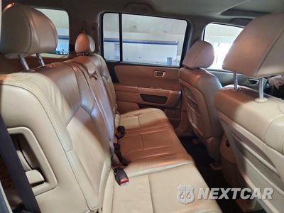 Zdjęcie 11 z 14 samochodu: 2011 HONDA PILOT EXL VIN:5FNYF3H54BB040802 - miniatura