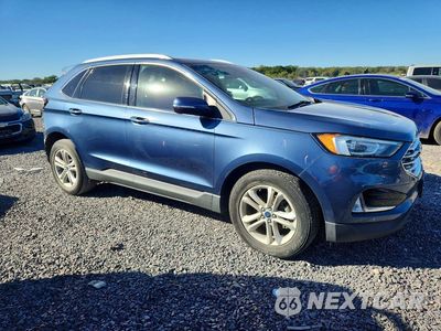 Czwarte zdjęcie samochodu z boku: 2019 FORD EDGE SEL VIN:2FMPK3J9XKBC47532 - miniatura