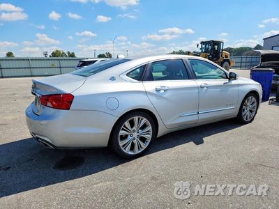 Trzecie zdjęcie samochodu z tyłu: 2014 CHEVROLET IMPALA LTZ VIN:1G1155S35EU103501 - miniatura