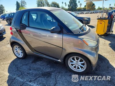 Czwarte zdjęcie samochodu z boku: 2011 SMART FORTWO PURE VIN:WMEEJ3BA2BK437548 - miniatura
