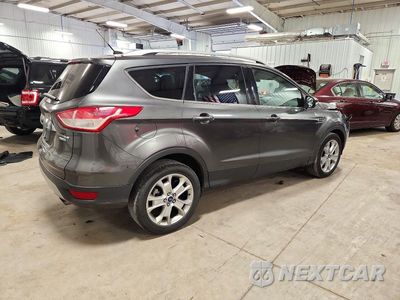 Trzecie zdjęcie samochodu z tyłu: 2015 FORD ESCAPE TITANIUM VIN:1FMCU9J91FUC23891 - miniatura
